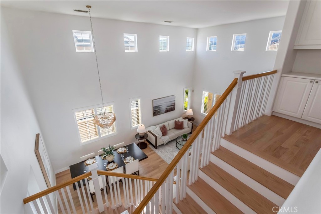 26413 Ocasey Place Stevenson Ranch, CA 91381 - Photo 29 of 75 a view of an entryway with wooden floor and windows