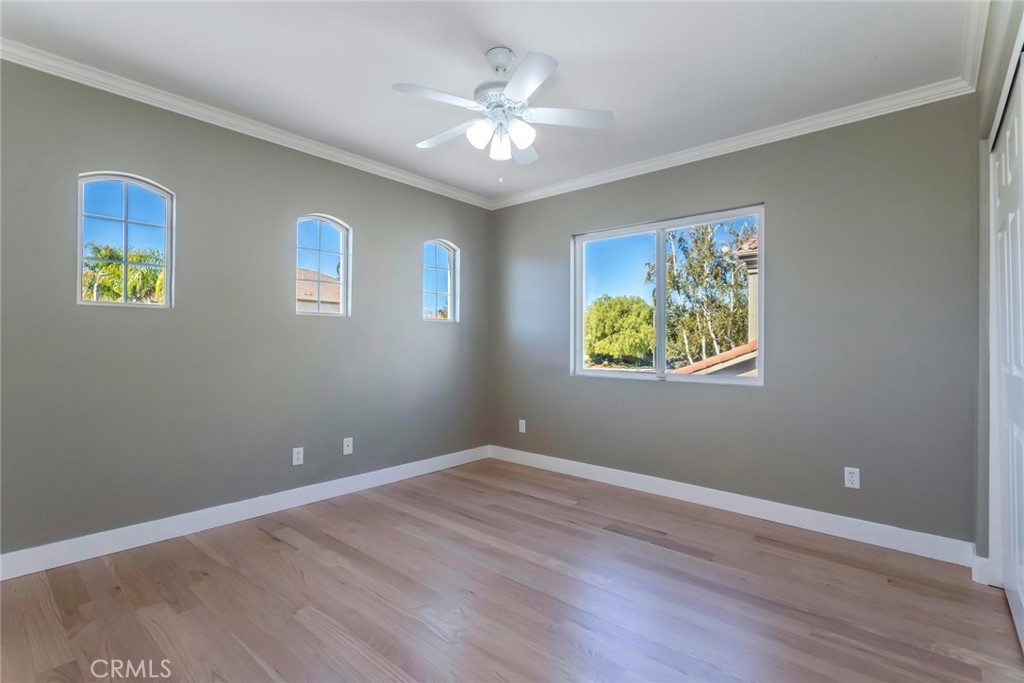 26413 Ocasey Place Stevenson Ranch, CA 91381 - Photo 48 of 75 a view of livingroom with window and ceiling fan