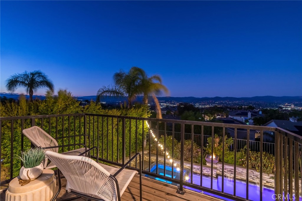 26413 Ocasey Place Stevenson Ranch, CA 91381 - Photo 71 of 75 a view of a balcony with two chairs