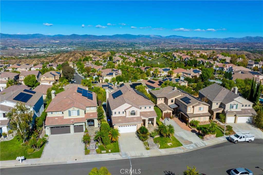 26413 Ocasey Place Stevenson Ranch, CA 91381 - Photo 75 of 75 an aerial view of residential houses with outdoor space and ocean view