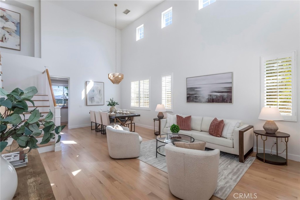 26413 Ocasey Place Stevenson Ranch, CA 91381 - Photo 9 of 75 a living room with furniture and a large window