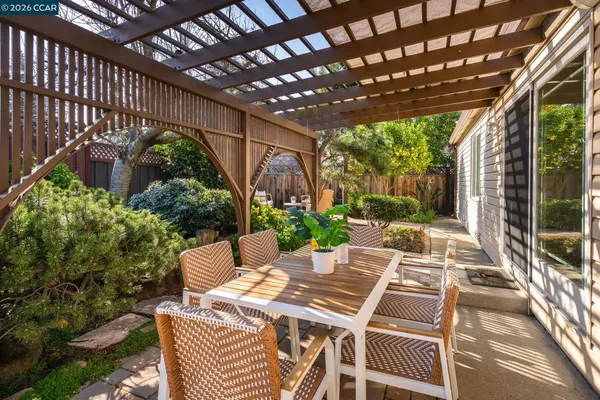 a view of yard with patio
