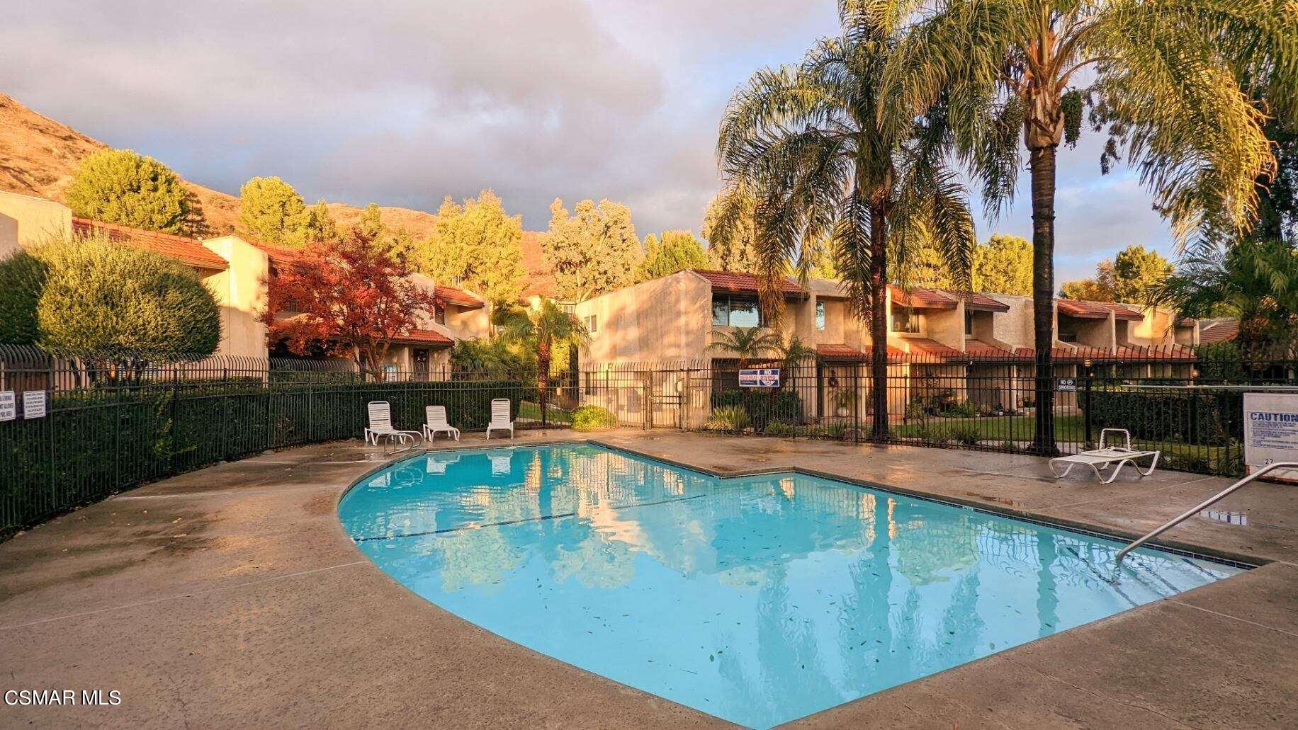 9758 Vía Roma Burbank, CA 91504 - Photo 7 of 8 a view of a swimming pool with a patio