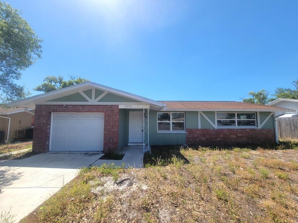 10225 Gardenia Lane Port Richey, FL 34668 - Photo 1 of 17