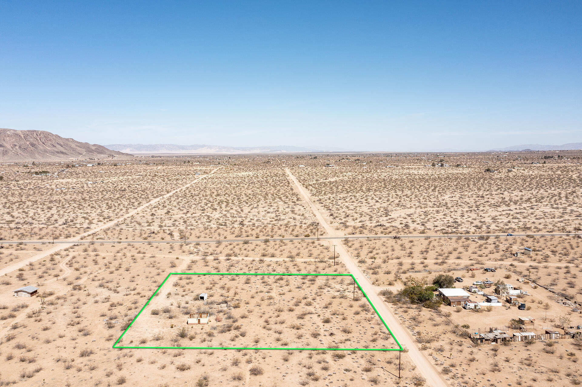 57628 Pine Street Landers, CA 92285 - Photo 13 of 25 an aerial view of residential houses with outdoor space