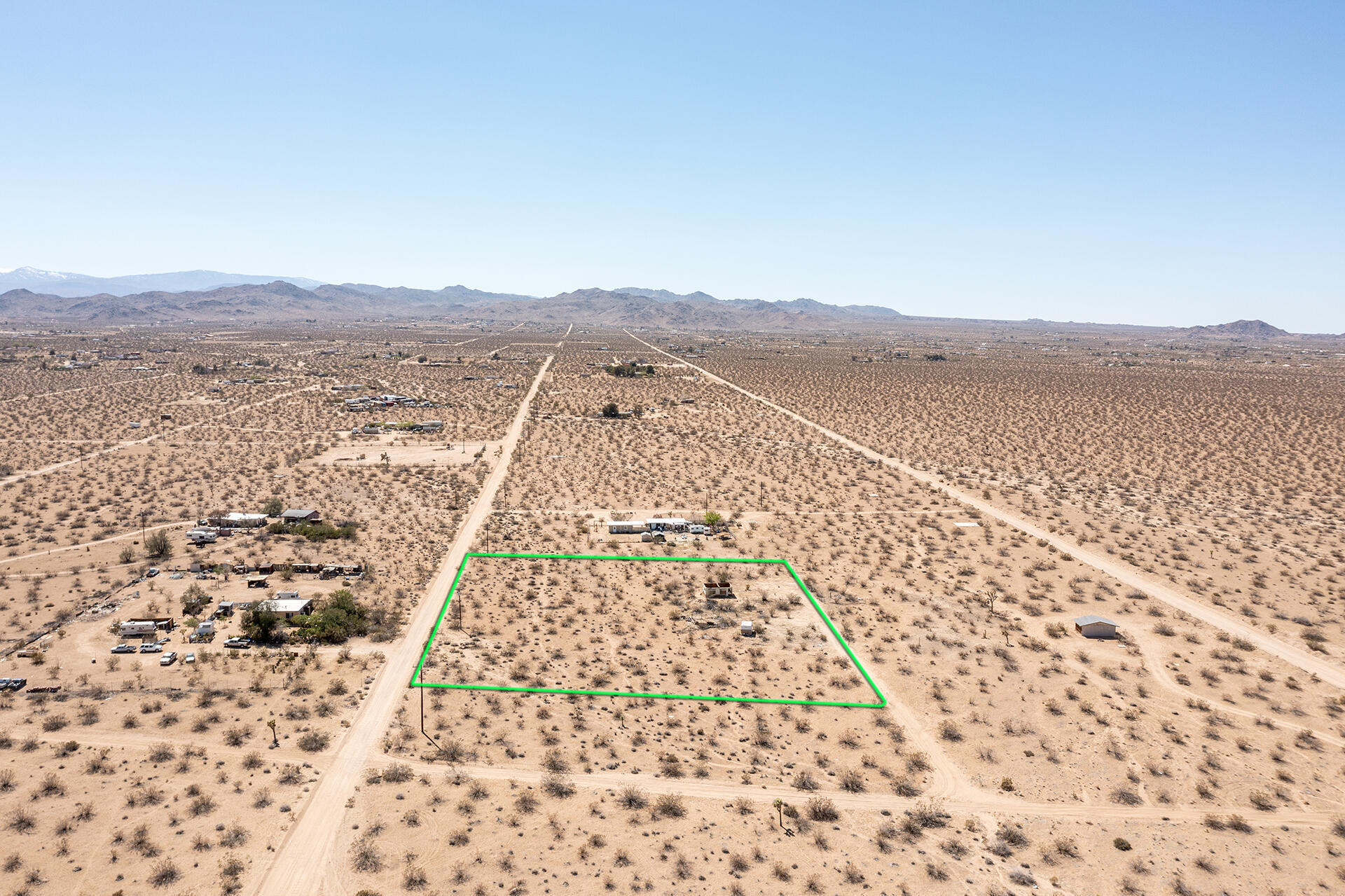 57628 Pine Street Landers, CA 92285 - Photo 3 of 25 an aerial view of residential houses with outdoor space