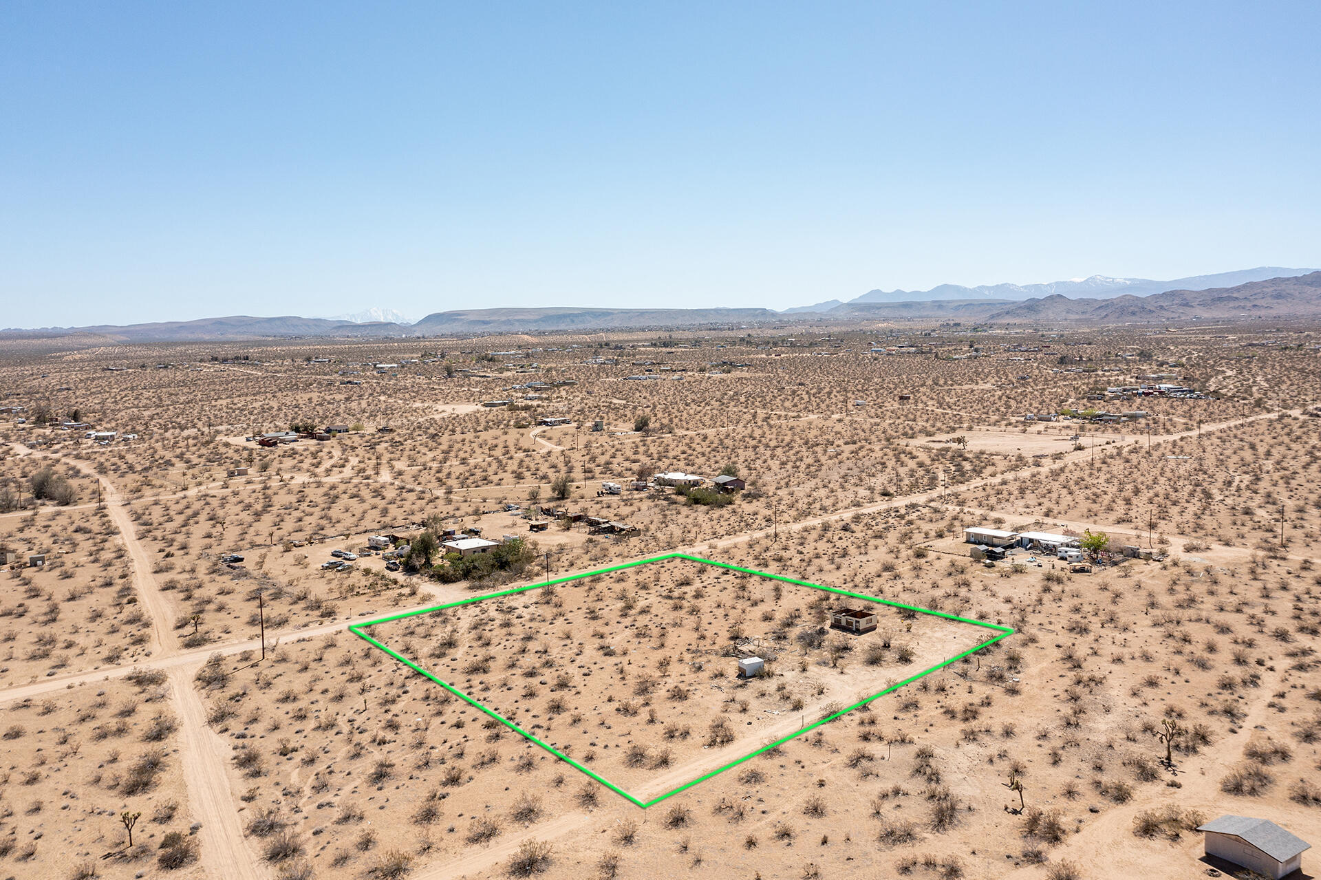 57628 Pine Street Landers, CA 92285 - Photo 9 of 25 an aerial view of residential houses with outdoor space