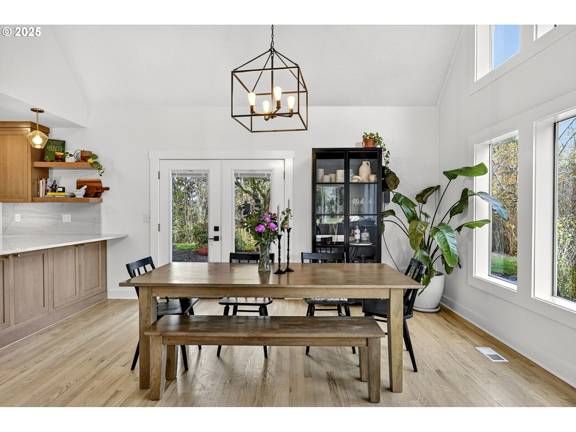 13162 Northwest McNamee Road Portland, OR 97231 - Photo 14 of 48 a view of a dining room with furniture window and wooden floor