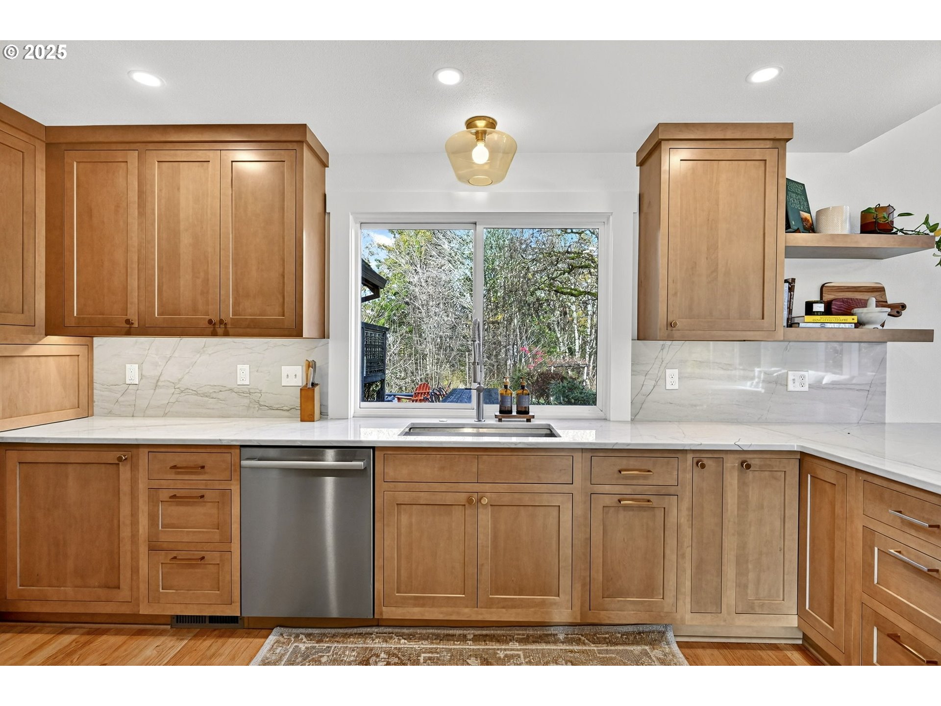 13162 Northwest McNamee Road Portland, OR 97231 - Photo 18 of 48 a kitchen with a sink and cabinets