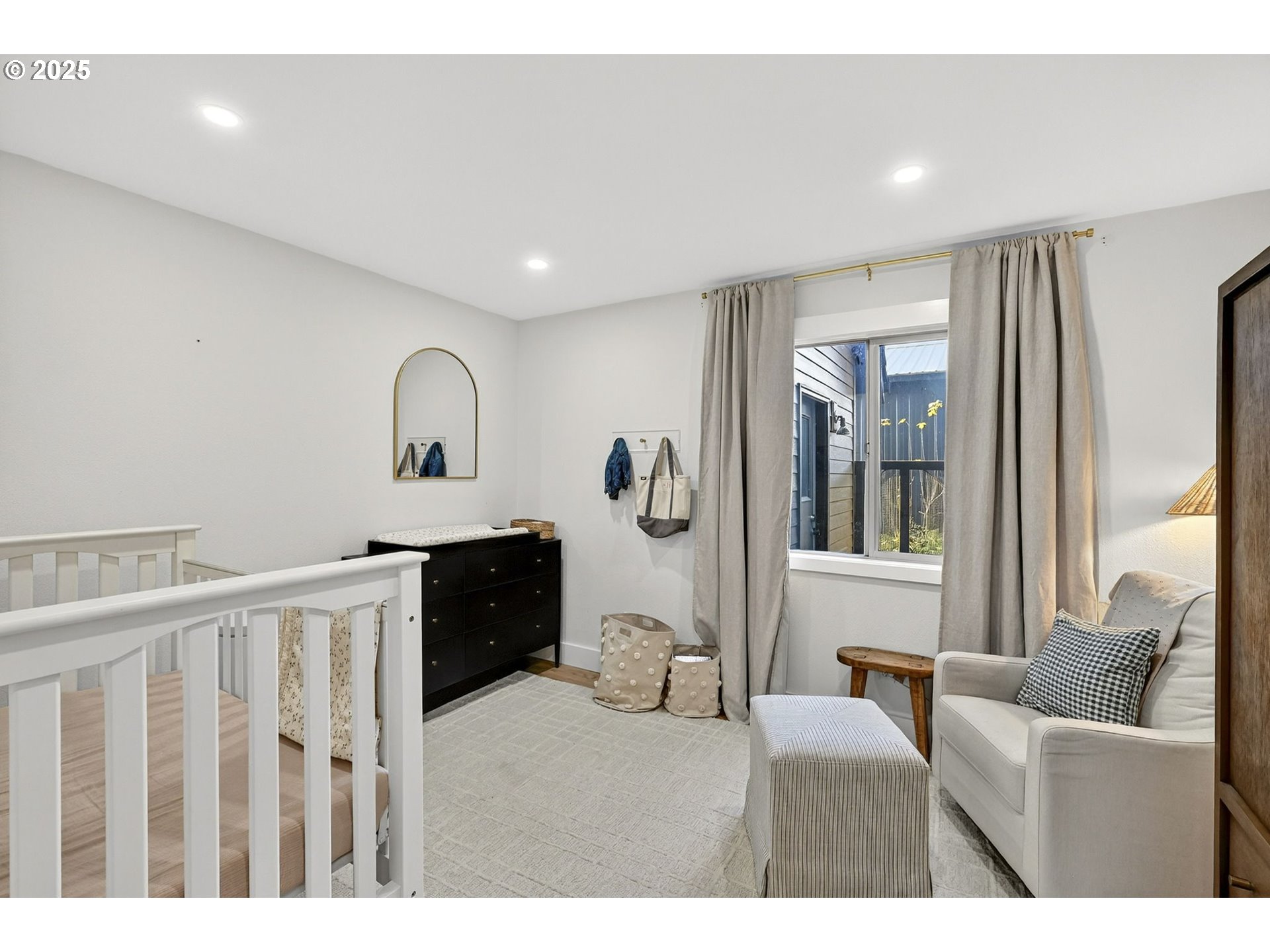13162 Northwest McNamee Road Portland, OR 97231 - Photo 27 of 48 a living room with furniture and wooden floor