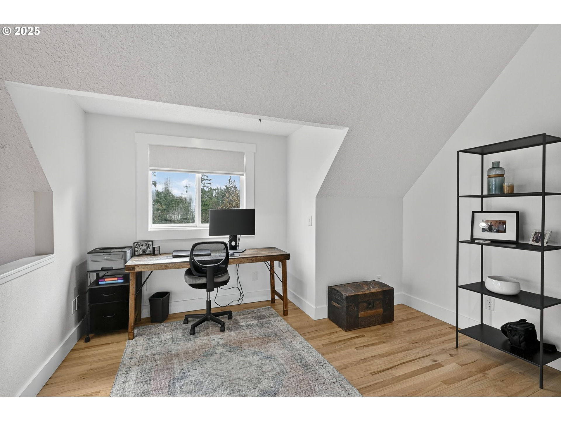 13162 Northwest McNamee Road Portland, OR 97231 - Photo 31 of 48 a workspace with furniture hardwood and a window