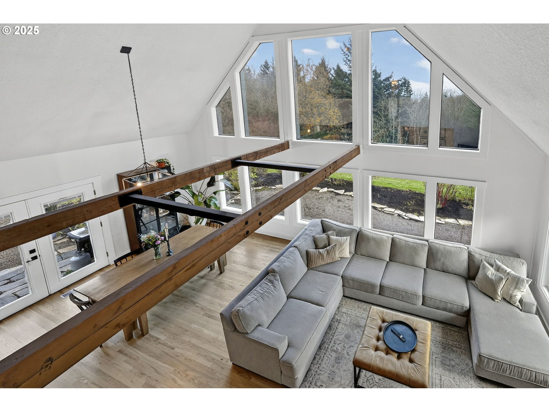 13162 Northwest McNamee Road Portland, OR 97231 - Photo 33 of 48 a view of a living room and workspace