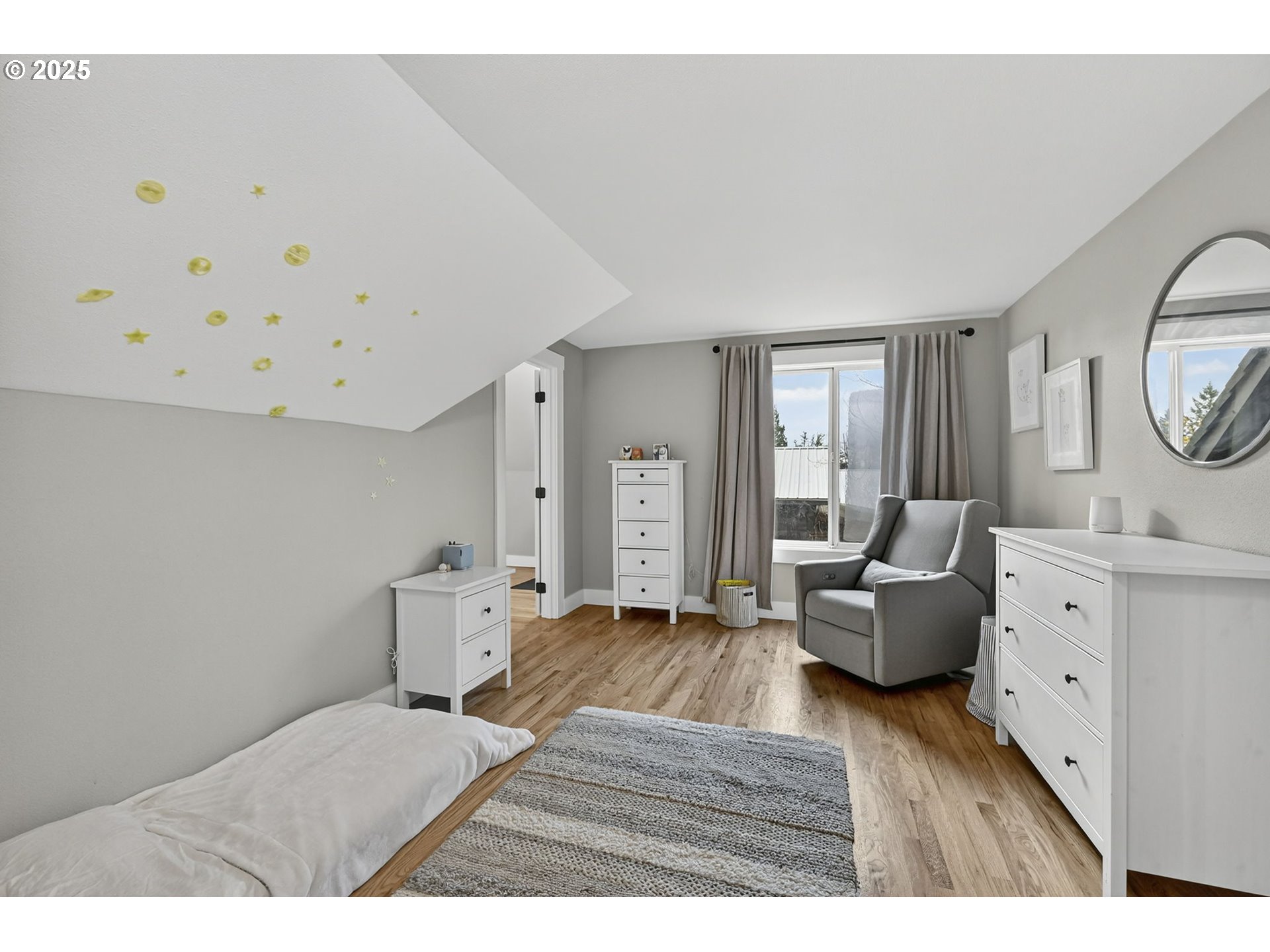 13162 Northwest McNamee Road Portland, OR 97231 - Photo 34 of 48 a living room with furniture and wooden floor
