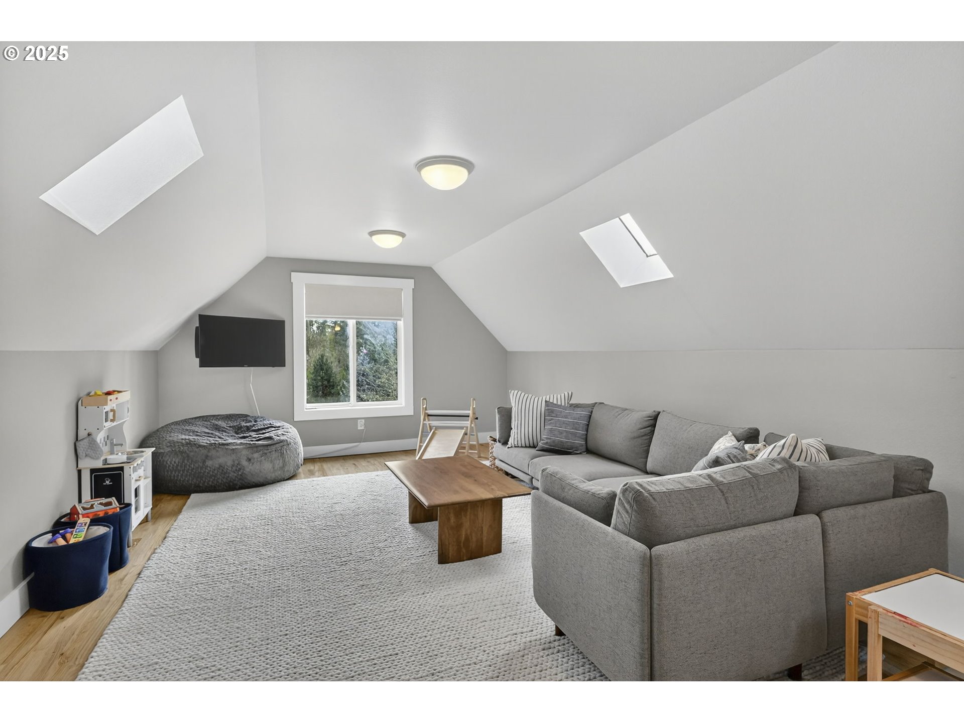 13162 Northwest McNamee Road Portland, OR 97231 - Photo 37 of 48 a living room with furniture large window and flat screen tv