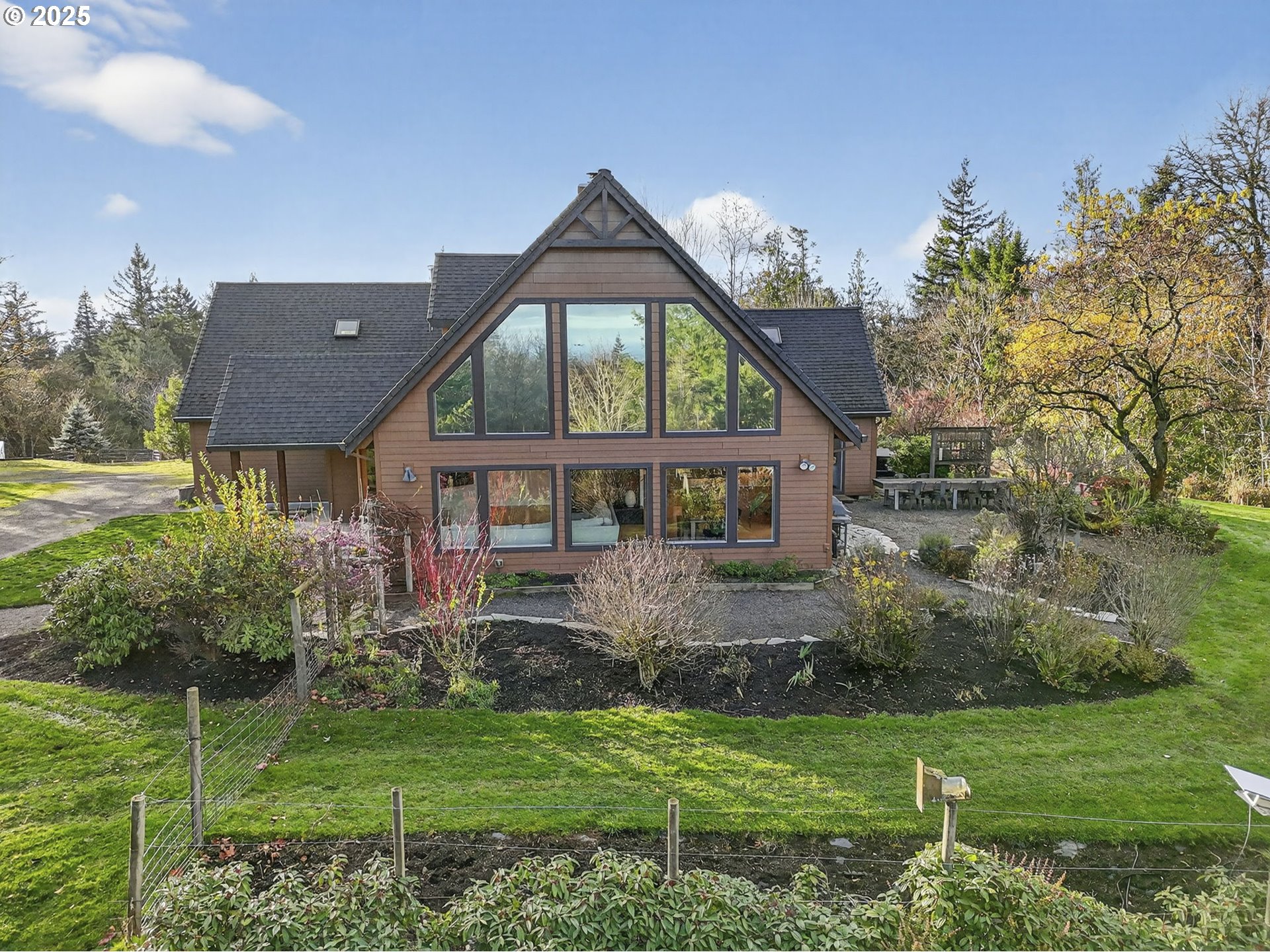 13162 Northwest McNamee Road Portland, OR 97231 - Photo 40 of 48 a front view of a house with a yard