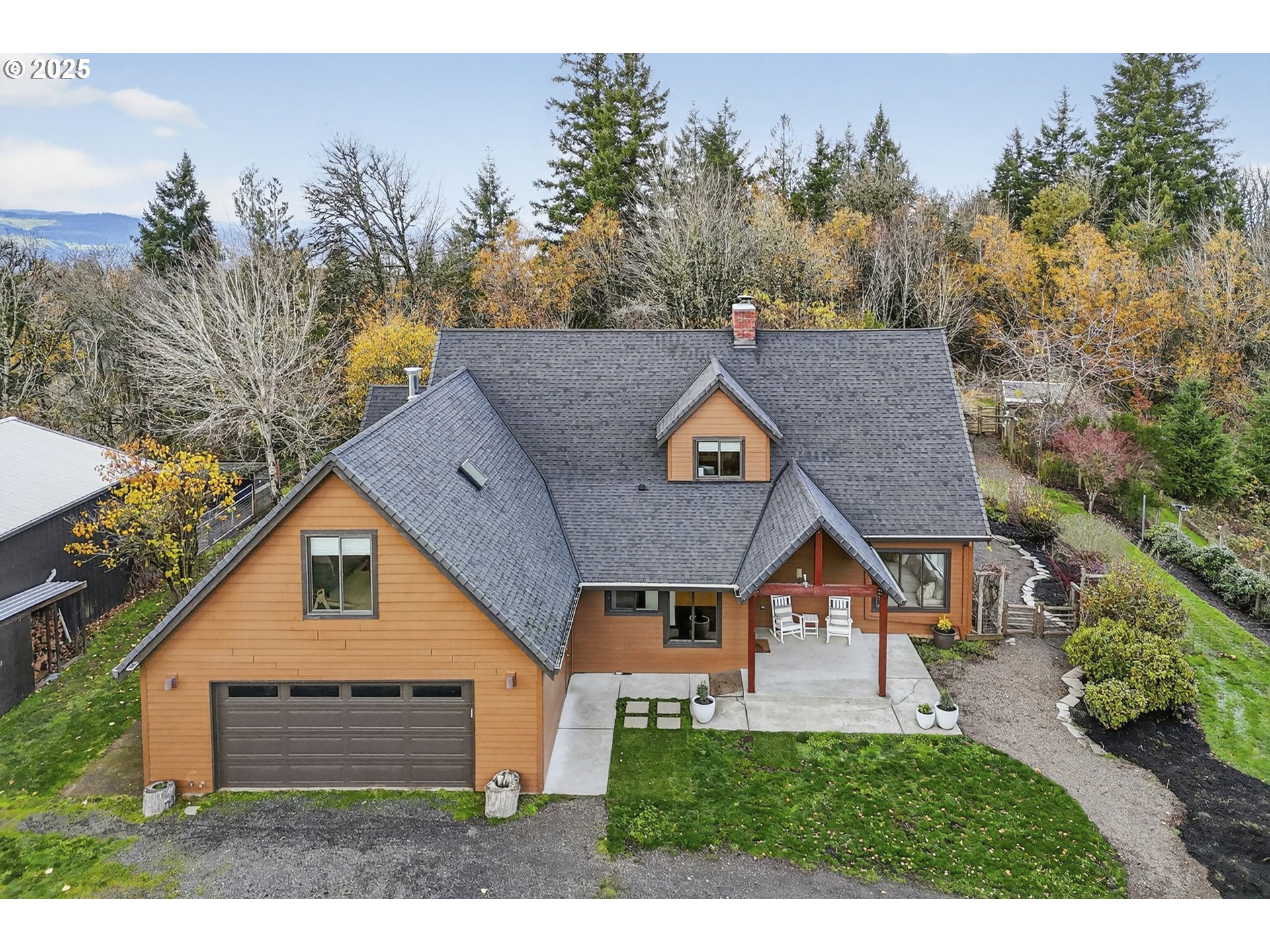 13162 Northwest McNamee Road Portland, OR 97231 - Photo 4 of 48 a aerial view of a house next to a yard