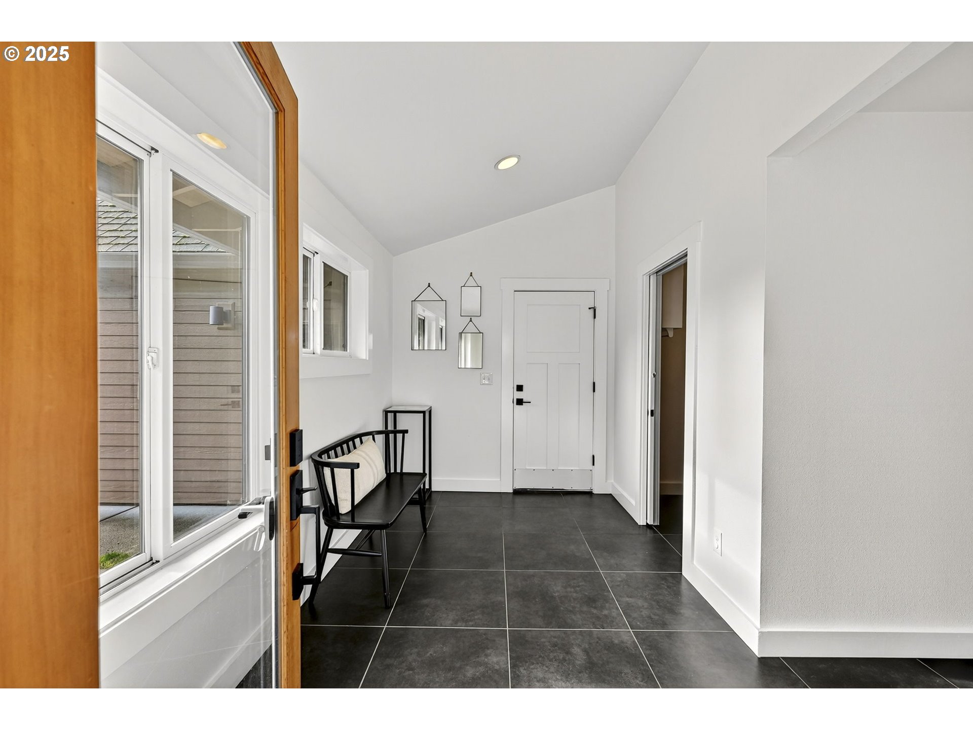 13162 Northwest McNamee Road Portland, OR 97231 - Photo 7 of 48 a view of an entryway with wooden floor