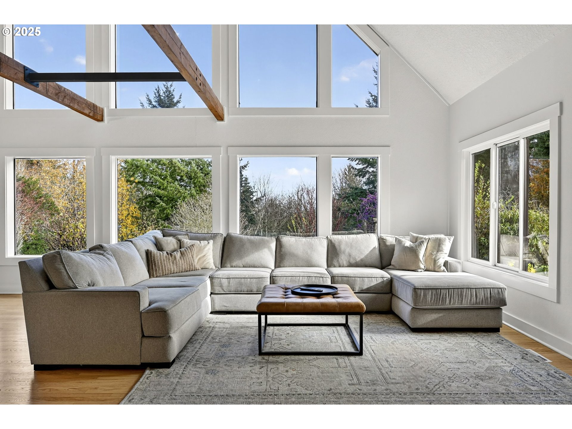 13162 Northwest McNamee Road Portland, OR 97231 - Photo 10 of 48 a living room with furniture and a large window