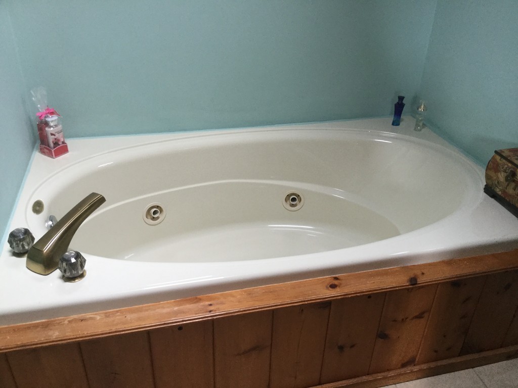 35 Downey Street Hopkinton, MA 01748 - Photo 19 of 28 a bathroom with a tub and sink
