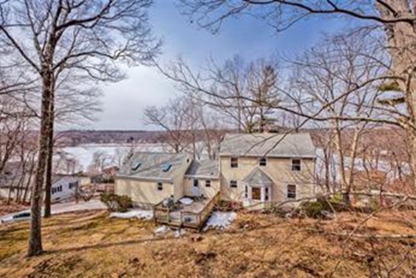 35 Downey Street Hopkinton, MA 01748 - Photo 2 of 28 front view of a house with a large tree