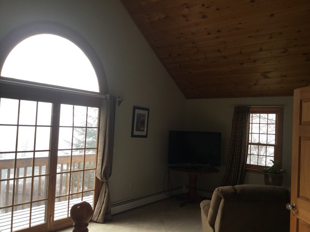 35 Downey Street Hopkinton, MA 01748 - Photo 21 of 28 a view of a livingroom with couch and windows