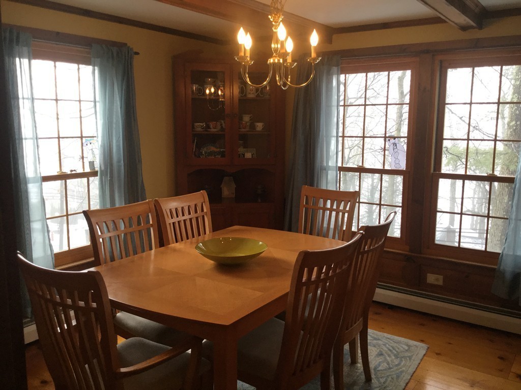 35 Downey Street Hopkinton, MA 01748 - Photo 6 of 28 a view of a dining room with furniture window and wooden floor
