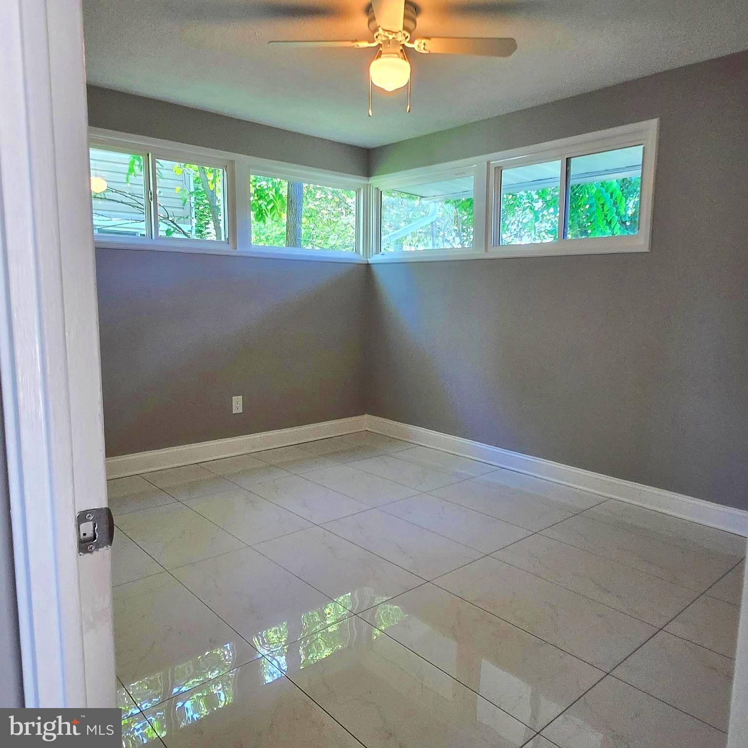 9711 Dilston Road Silver Spring, MD 20903 - Photo 24 of 44 an empty room with a window