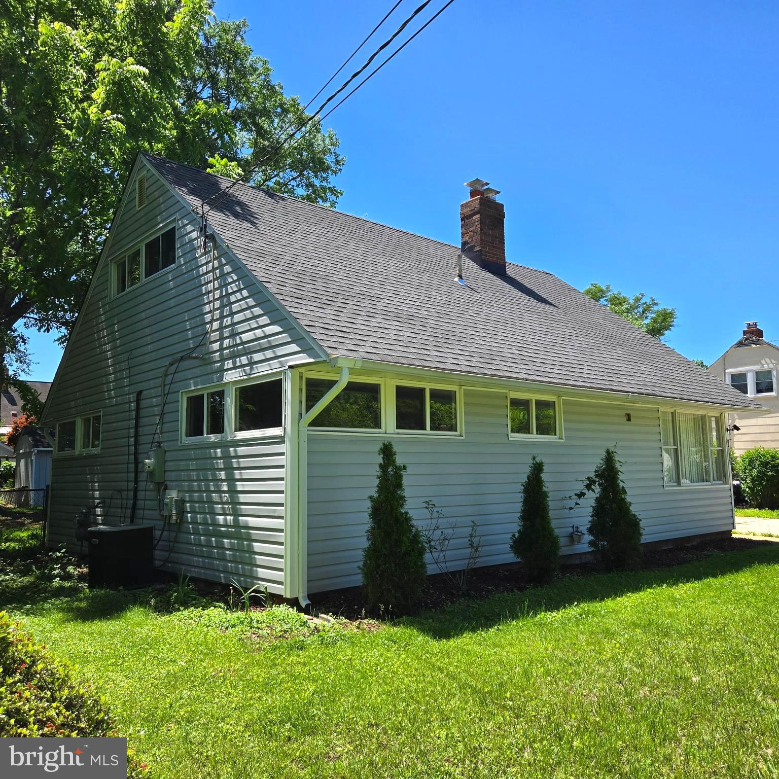 9711 Dilston Road Silver Spring, MD 20903 - Photo 3 of 44 a front view of a house with a yard
