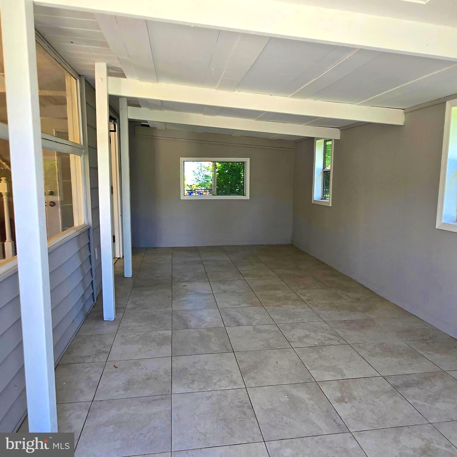 9711 Dilston Road Silver Spring, MD 20903 - Photo 31 of 44 an empty room with windows