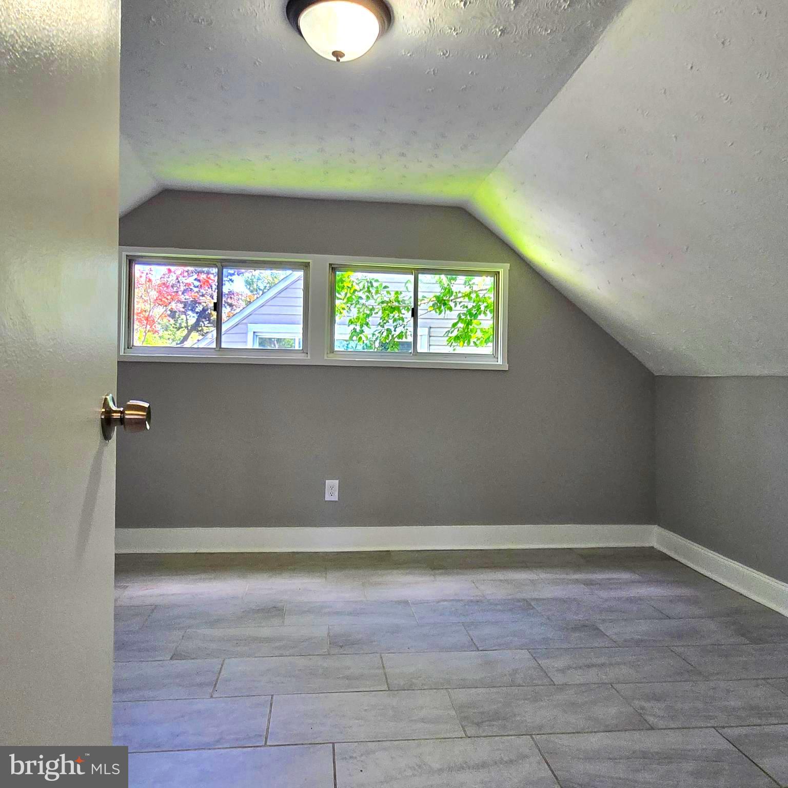 9711 Dilston Road Silver Spring, MD 20903 - Photo 42 of 44 a view of room with a window