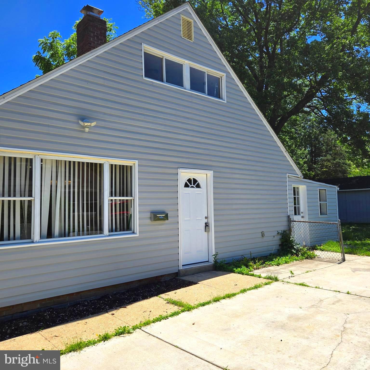 9711 Dilston Road Silver Spring, MD 20903 - Photo 7 of 44 a backyard of a house