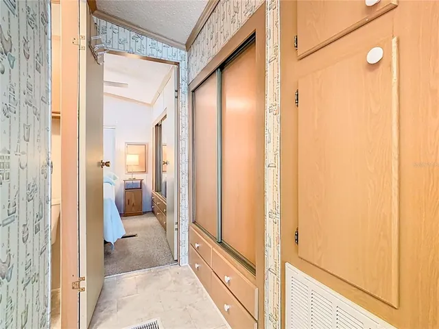 a view of a bathroom with a glass door and shower