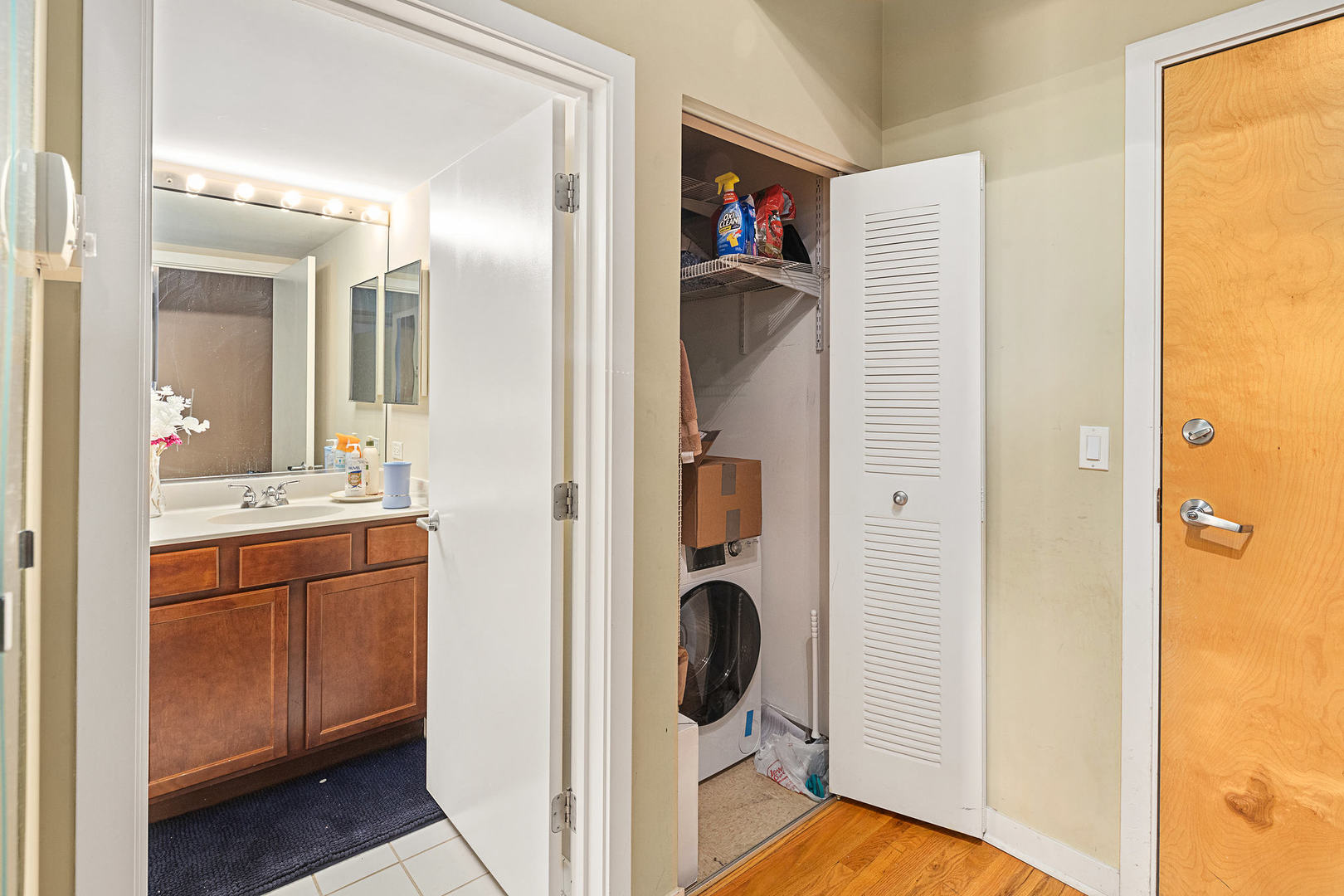 1111 West 15th Street, Unit 235 Chicago, IL 60608 - Photo 18 of 21 a bathroom with a shower and a sink