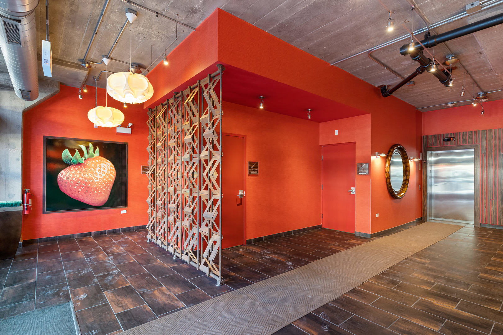 1111 West 15th Street, Unit 235 Chicago, IL 60608 - Photo 4 of 21 a view of a room with wooden floor