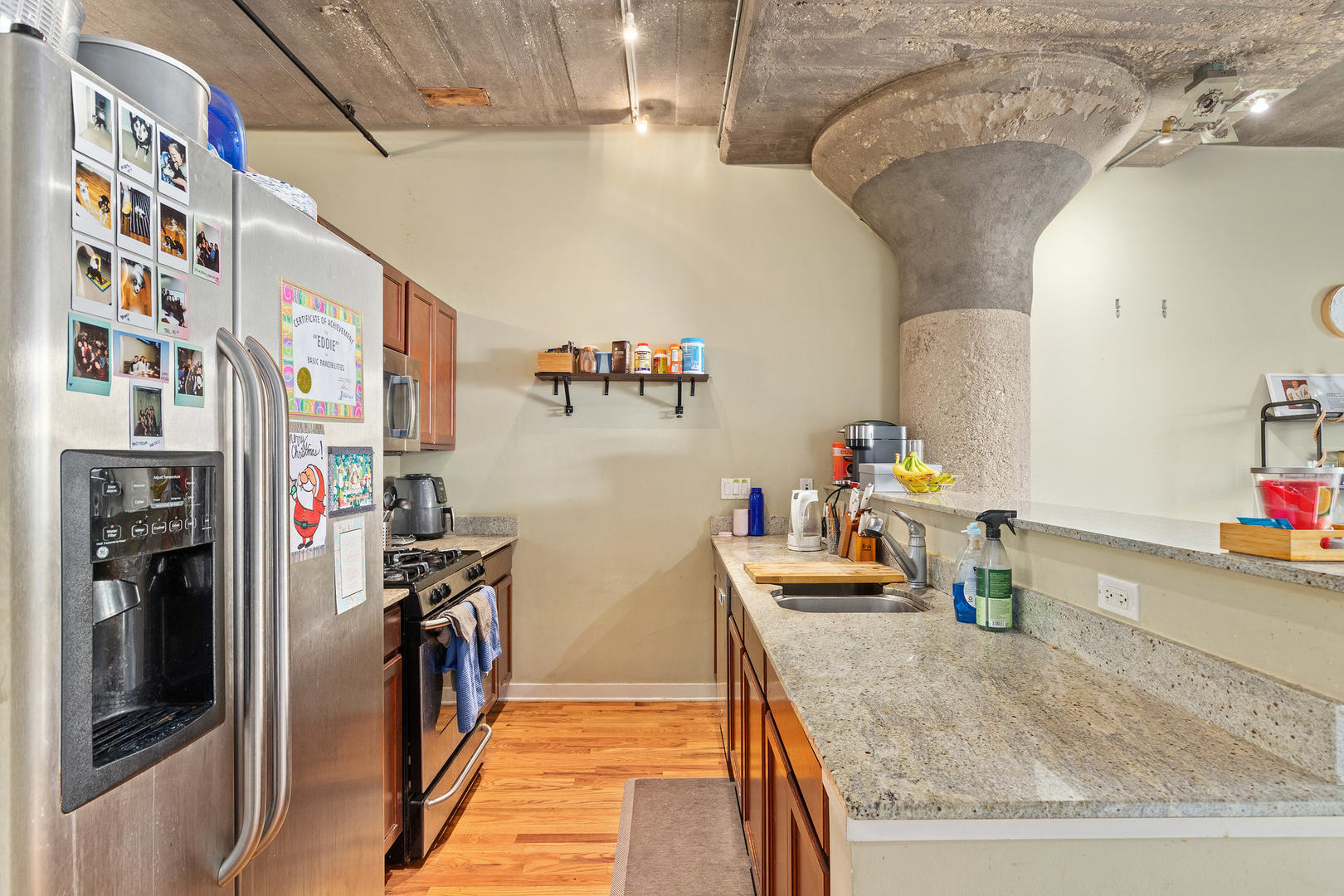1111 West 15th Street, Unit 235 Chicago, IL 60608 - Photo 10 of 21 a view of a living room and bathroom
