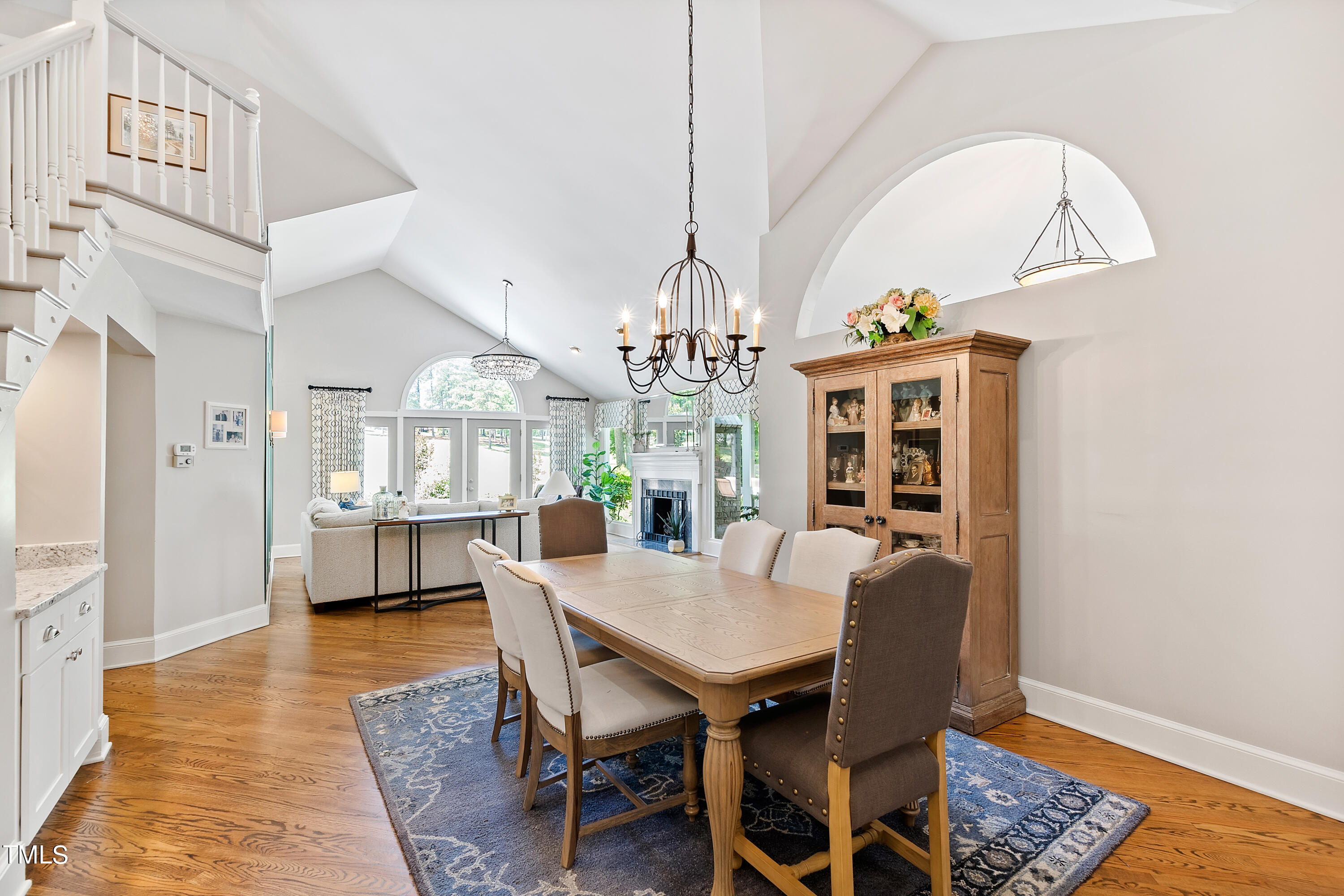 1605 Quaker Ridge Point Raleigh, NC 27615 - Photo 4 of 54 a view of a dining room with furniture window and wooden floor