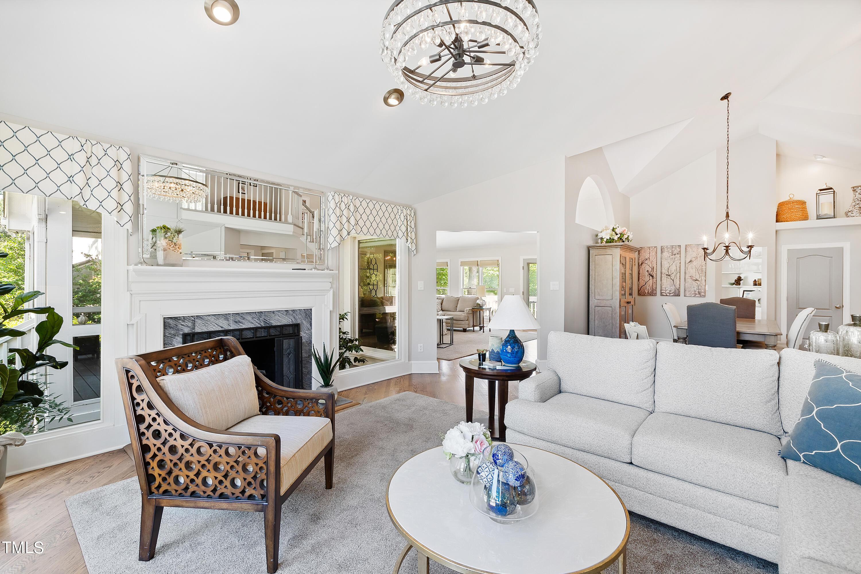 1605 Quaker Ridge Point Raleigh, NC 27615 - Photo 6 of 54 a living room with furniture couches and a fireplace