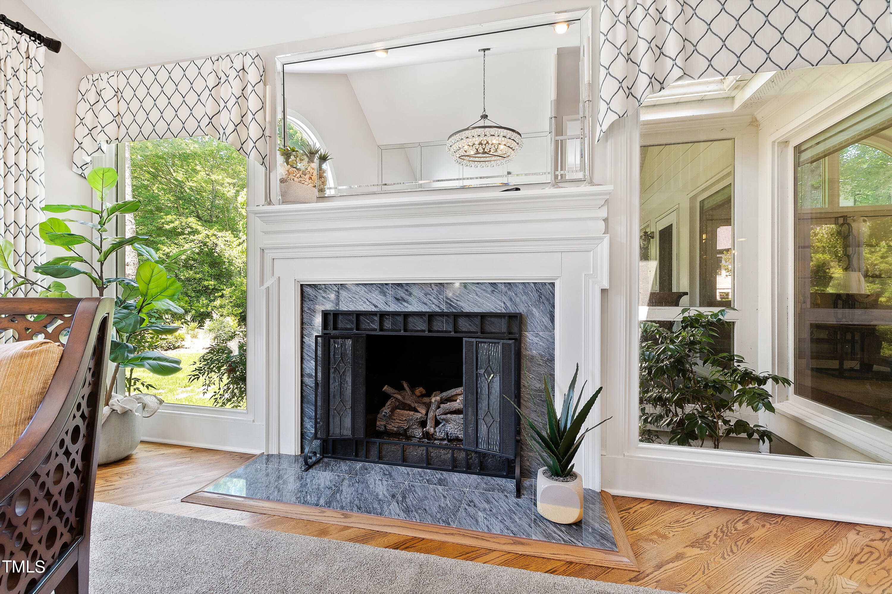 1605 Quaker Ridge Point Raleigh, NC 27615 - Photo 7 of 54 a view of living room with furniture and a fireplace