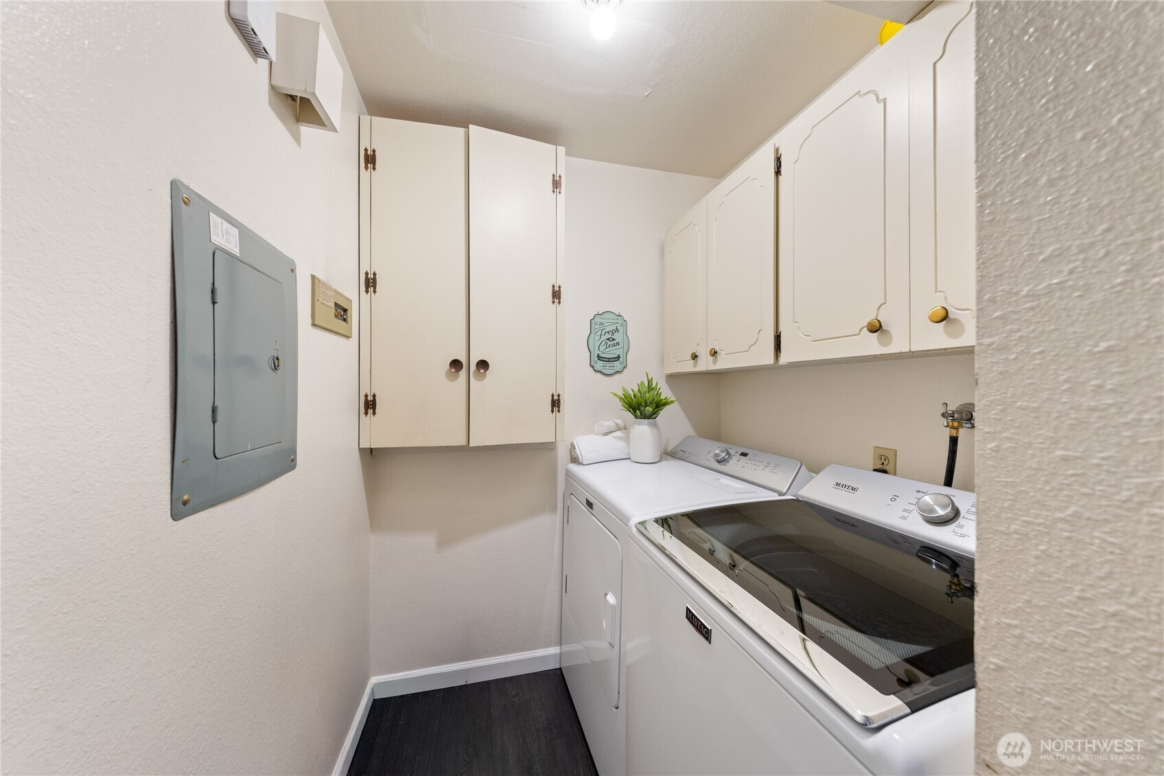 242 4th Avenue South, Unit 2 Edmonds, WA 98020 - Photo 24 of 34 a view of cabinets a sink and dishwasher in a white cabinet