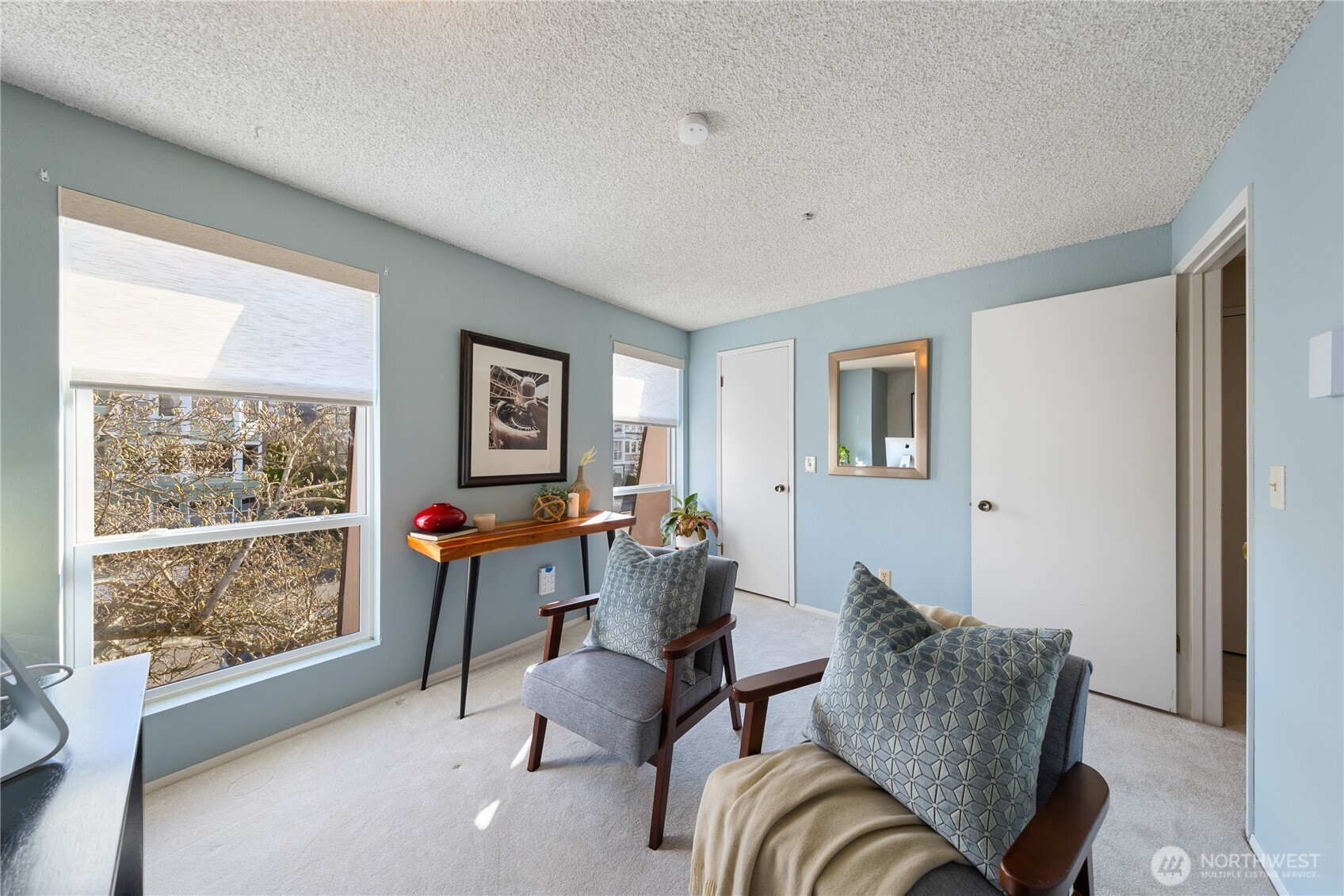 242 4th Avenue South, Unit 2 Edmonds, WA 98020 - Photo 28 of 34 a living room with furniture and a window