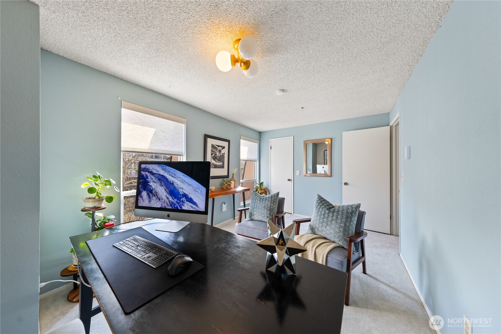 242 4th Avenue South, Unit 2 Edmonds, WA 98020 - Photo 29 of 34 a room with furniture gym equipment and a window