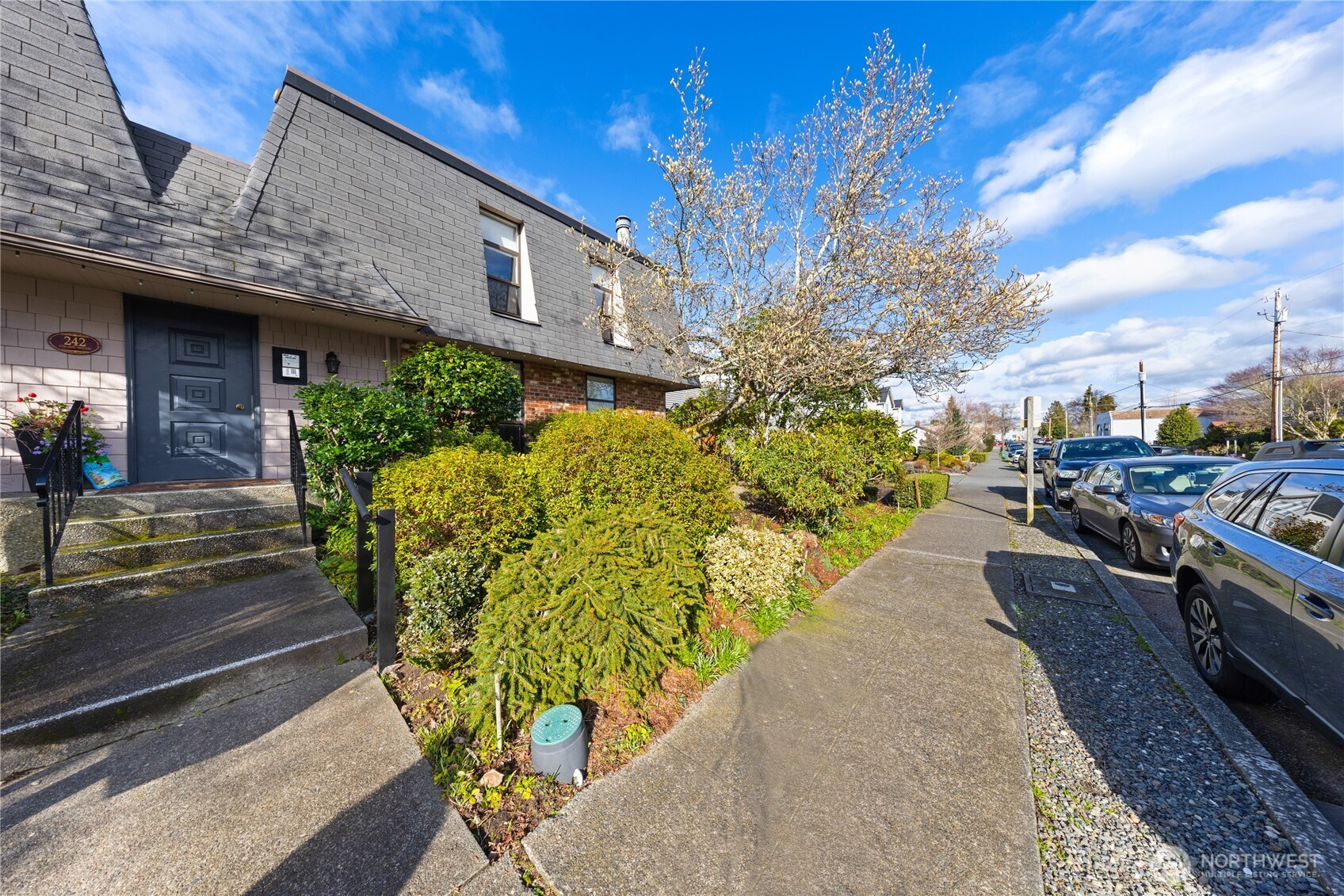 242 4th Avenue South, Unit 2 Edmonds, WA 98020 - Photo 34 of 34 a view of a building with sitting area