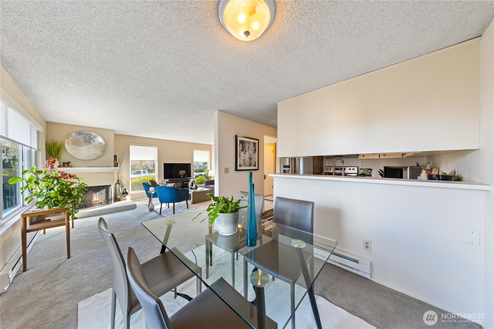 242 4th Avenue South, Unit 2 Edmonds, WA 98020 - Photo 7 of 34 a view of a dining room with furniture window and wooden floor