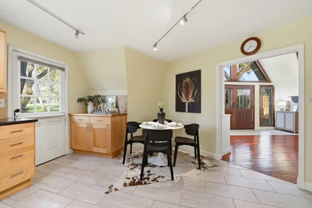 a kitchen with granite countertop a sink and a window