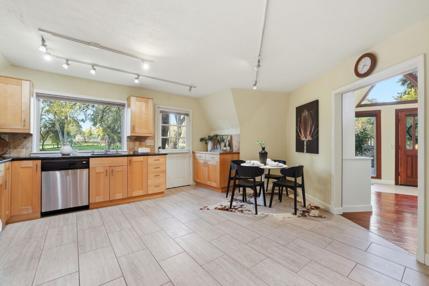 7890 Boren Lane Granite Bay, CA 95746 - Photo 20 of 96 a large open kitchen with a table and chairs