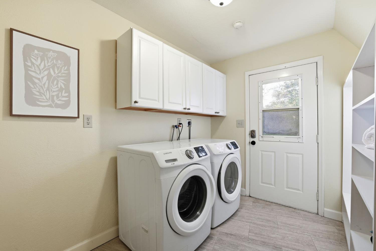 7890 Boren Lane Granite Bay, CA 95746 - Photo 41 of 96 a utility room with dryer and washer