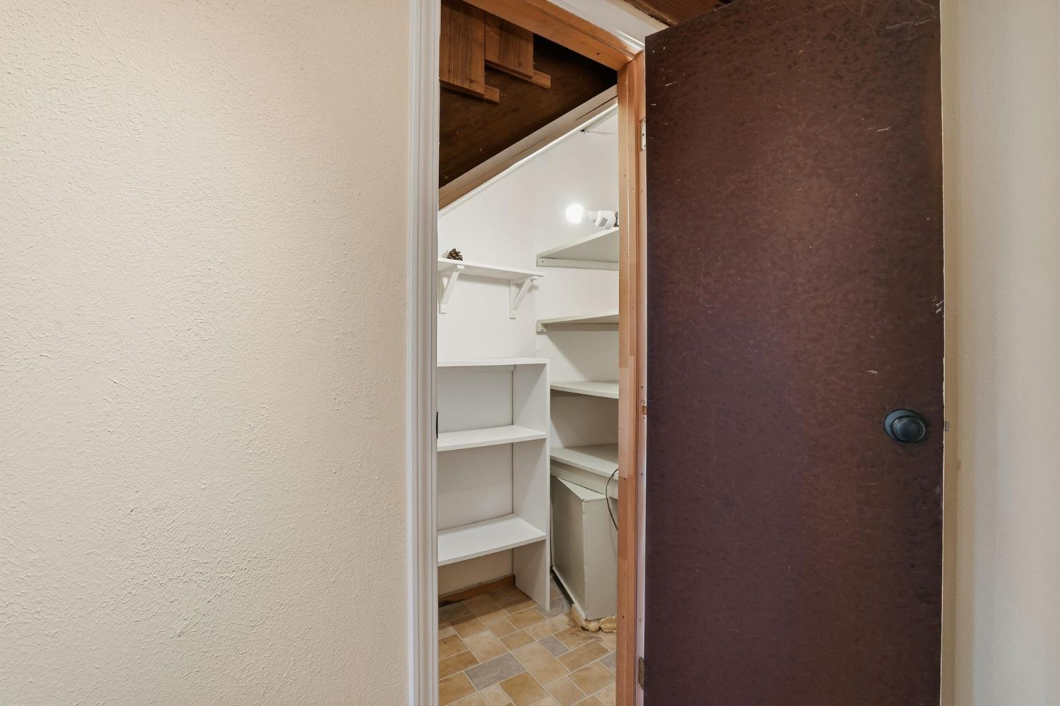 7890 Boren Lane Granite Bay, CA 95746 - Photo 42 of 96 a view of a hallway with wooden floor and entryway