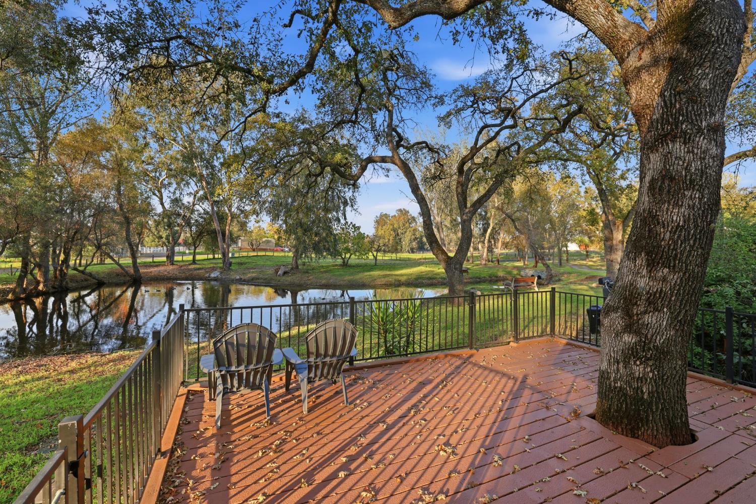 7890 Boren Lane Granite Bay, CA 95746 - Photo 44 of 96 a view of a balcony with wooden floor and outdoor seating