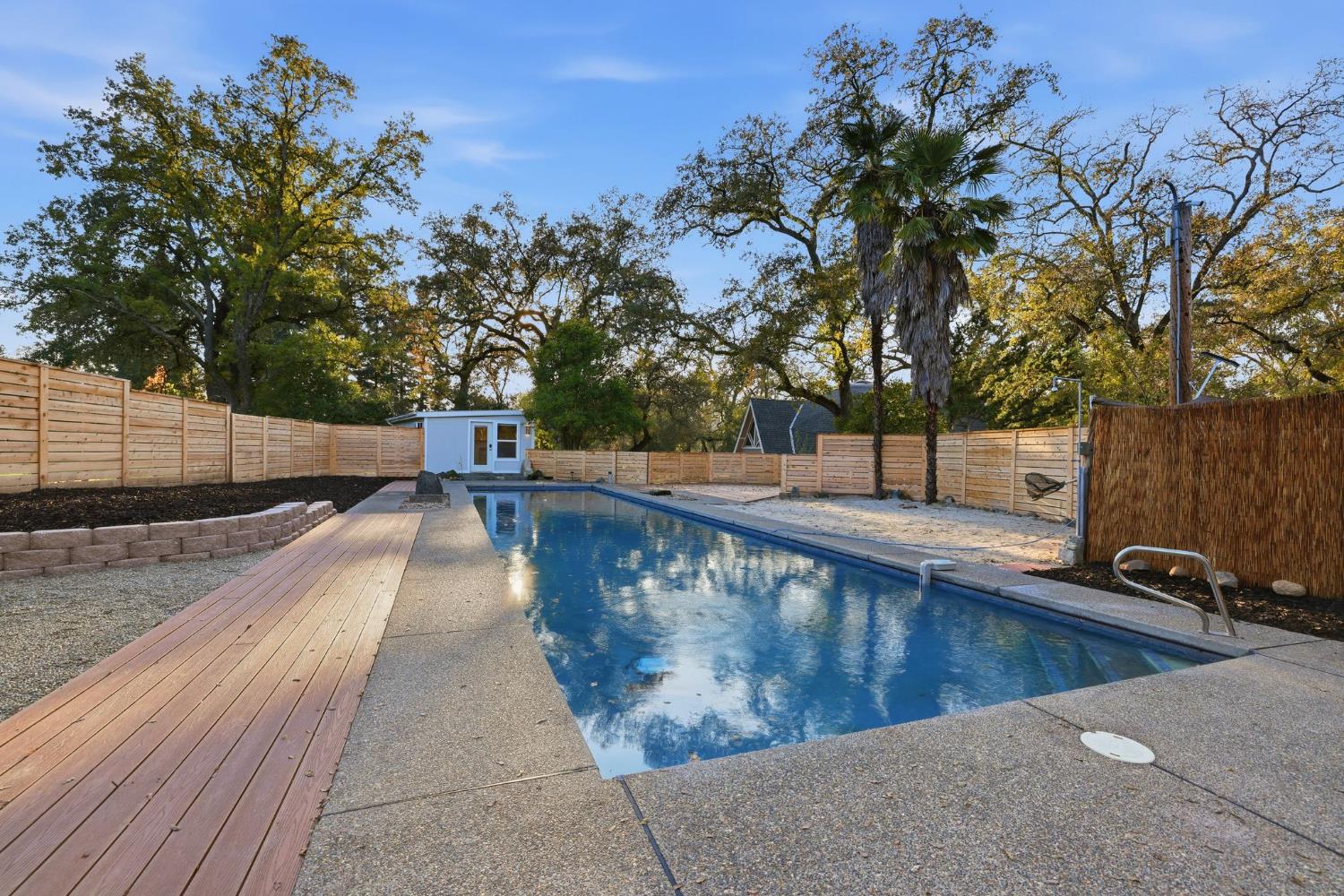 7890 Boren Lane Granite Bay, CA 95746 - Photo 68 of 96 a view of a swimming pool with a chair