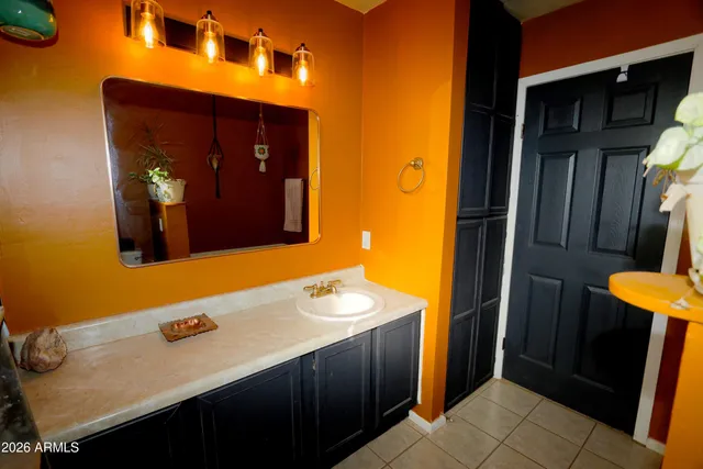 a bathroom with a sink and toilet